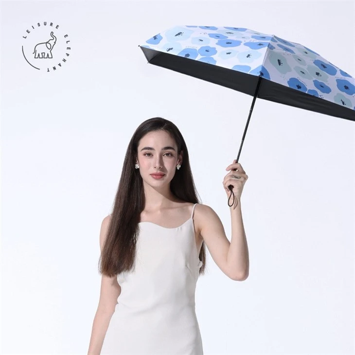 blue folding umbrella